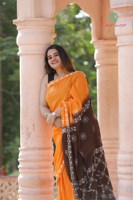 'Sunshine through the woods' Orange Mulmul Chikankari Saree