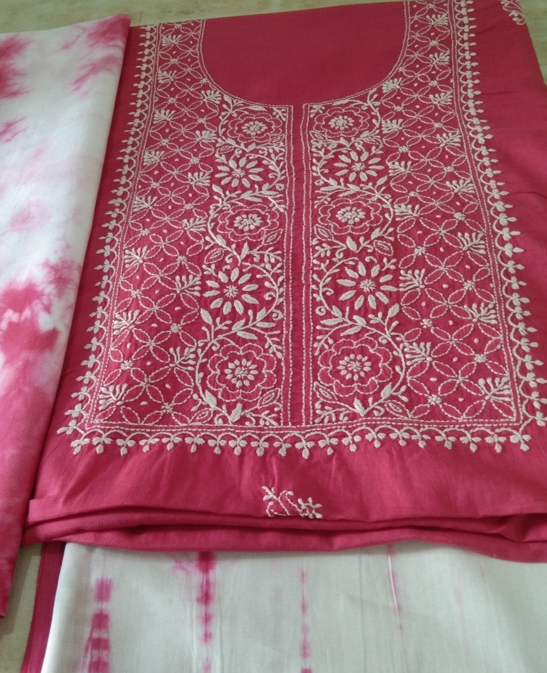 Magenta and white embroidered fabric with tie-dye dupatta and pant pattern 
